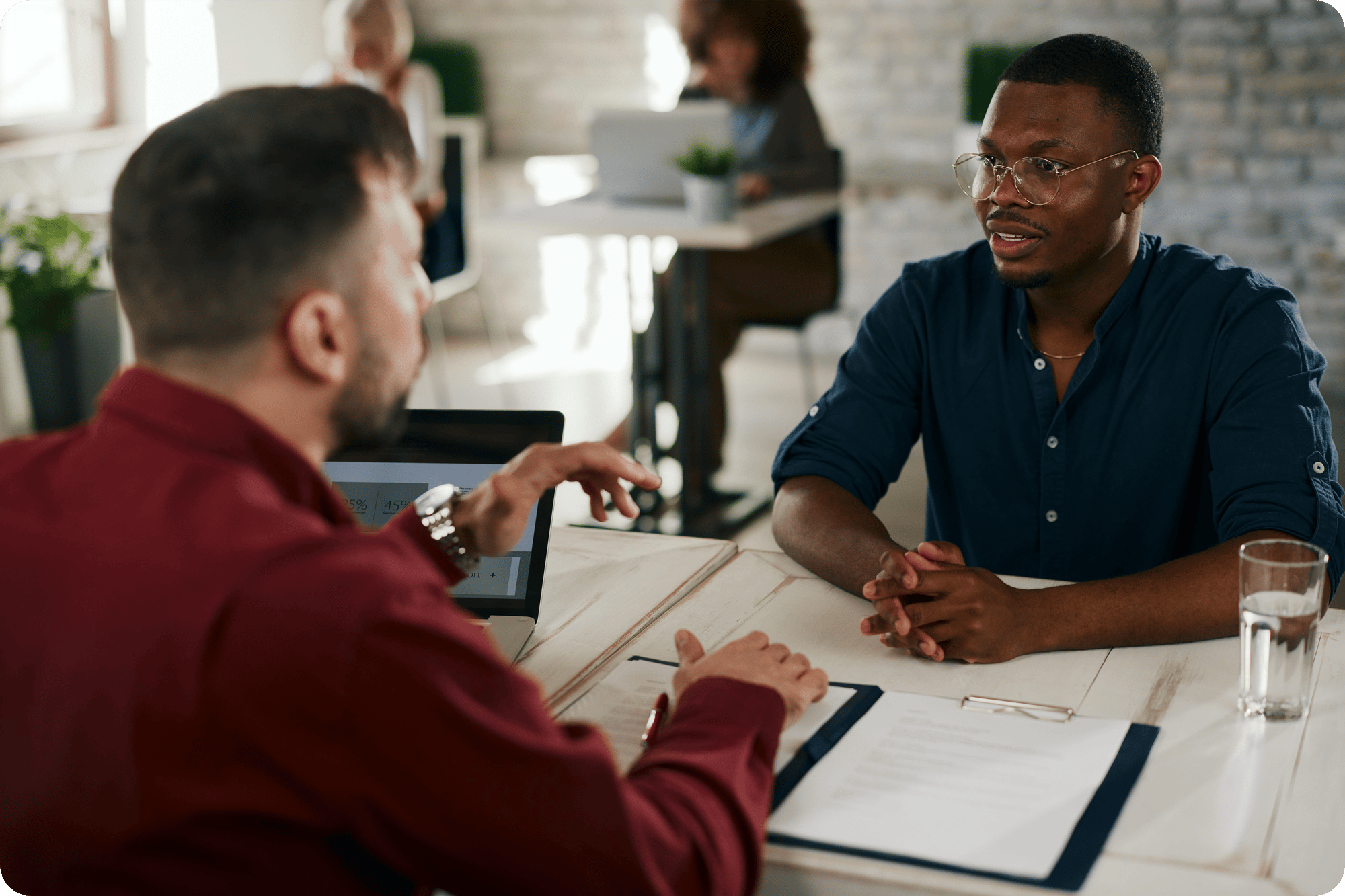 Manager Conducting an Interview With an Employee