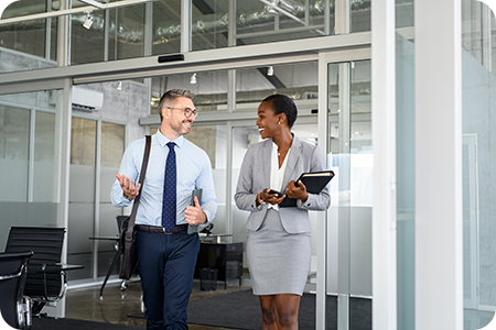 Two Employees Leaving An Office Together